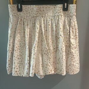 Emily McCarthy Gold Star Patterned Skirt. Never worn.  Size L. Pockets!!